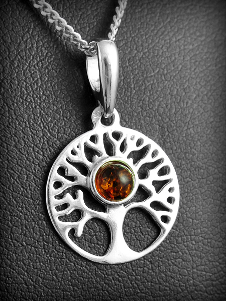 Pendentif en argent , très joli arbre de vie et perle d'ambre (h:24mm).