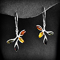 Boucles d'Oreille Ambre Tricolore Argent - BOAG-227 Très belle paire de boucles d'oreille en argent ornée de 4 perles d'ambre véritable de la mer...