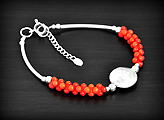 Joli bracelet en argent et corail rouge, longueur réglable en chaînette de 17,5 à 19cm (ep:14mm).