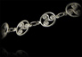 Trés beau bracelet en argent formé de 8 triskel cerclé de 13mm (L:19cm).