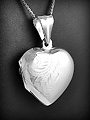Pendentif cœur boîte en argent, pour garder une photo ou un souvenir sur soi, avec le couvercle...