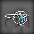 Bague en argent d'un joli attrape rêve de style amérindien avec une perle de turquoise ou...