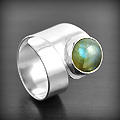 Bague en argent Labradorite en cabochon rond serti clos avec une monture enroulée réglable,...