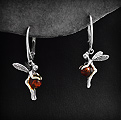 Jolies boucles d'oreilles en argent 925 d'une petite fée tenant une perle d'ambre couleur...