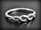 Bracelet en argent  de jolis cordage entrelac&eacute;s C'est un mod&egrave;le creux et donc souffl&eacute;, procurant...
