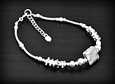 Bracelet en argent mat, modèle original Ethnique longueur réglable en chaînette de 17,5 à 19cm...