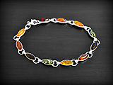 Bracelet en argent  de onze petites amandes d' ambre cognac (l:5mm, L:19 cm).