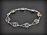 Très beau bracelet en argent et ambre véritable cognac  (ep:9mm.L:19cm).