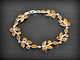 Très beau bracelet feuillage argent et ambre cognac, ou multicolore (l:12mm, L:19.5cm).