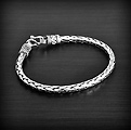 Très beau bracelet en argent d'un tressage large, fabrication artisanale, très belle...