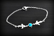 Charmant bracelet en argent maille ronde jaseron, et composé d'une petite pierre de turquoise...