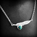 Magnifique collier en argent maille rond jaseron, d'une plume ornée d'une petite turquoise...