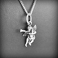 Pendentif Angelot du paradis en argent avec trompette pour passer la voie de dieu, bélière assez...