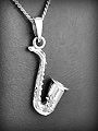 Pendentif en argent d'un beau saxophone tout en volume de très belle finition (h:27 mm).