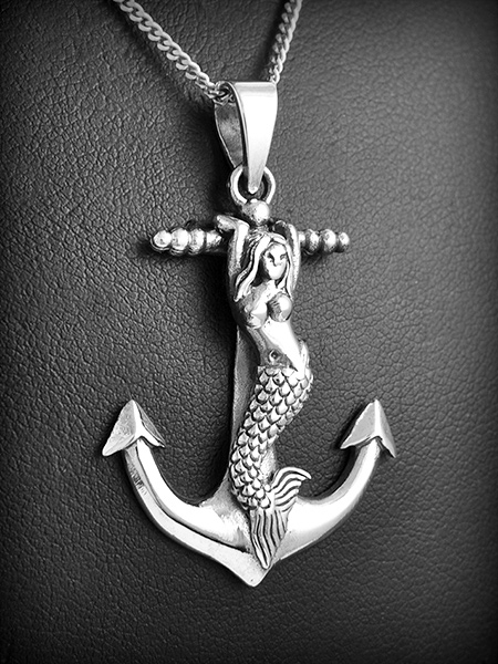 Pendentif en argent d'une ancre marine en volume parée d'une sirène (h:40mm).