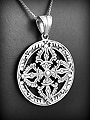 Pendentif en argent  une fleur de vie utilisée comme symbole géométrie sacré, délicatement ciselé...