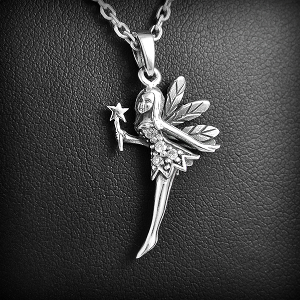 Très joli pendentif en argent d'une fée en 3D  parée de sa baguette magique et ornée de 4 petits...